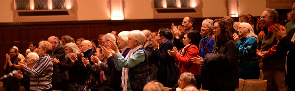 The crowd reacts when Orlando and Phyllis Rodriguez step onto the stage.