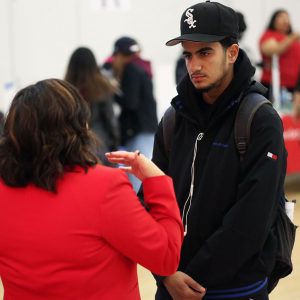 Jariel Noel listens to a counselor from New York Institute of Technology. 