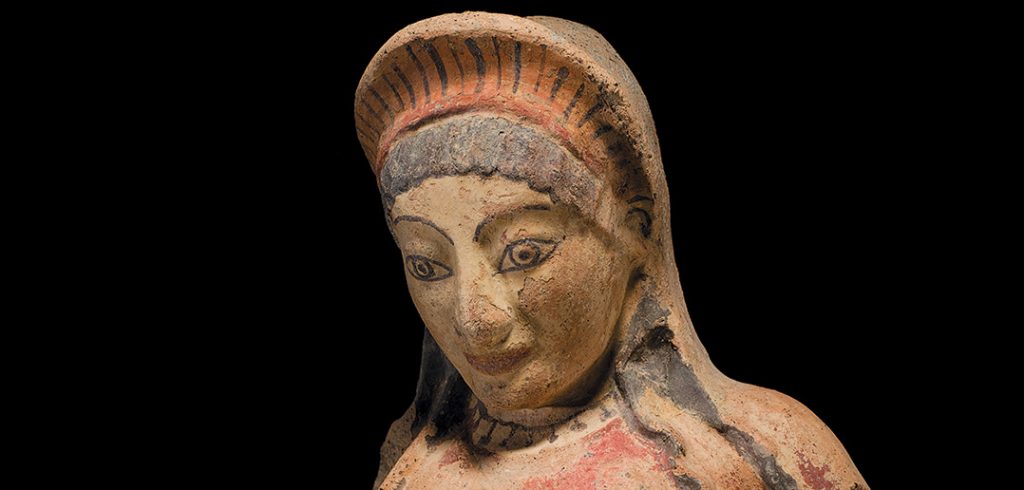 A terracotta antefix depicting an Etruscan woman, one of 260-plus antiquities in the Fordham Museum of Greek, Etruscan, and Roman Art