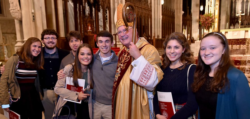 Cardinal Dolan and a few rams. 