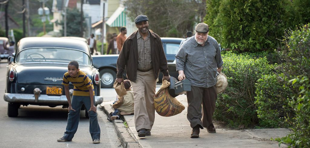 Fordham alumnus Denzel Washington and Stephen McKinley Henderson in a scene from the Oscar-nominated movie Fences.