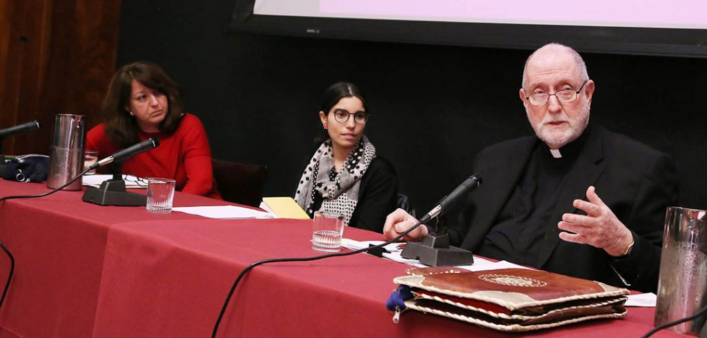 Ebru Turan, Sarit Kattan Gribetz and Patrick Ryan, SJ, seated at a table in the tweflth floor lounge