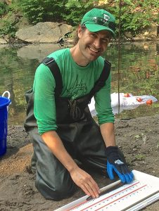 Jason Aloisio, working alongside a stream