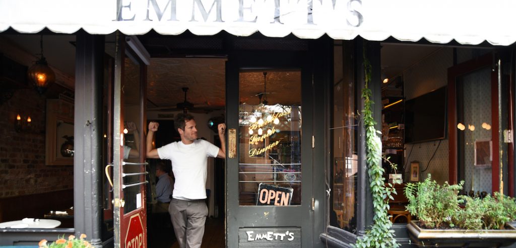 Fordham alumnus Emmett Burke at his restaurant on MacDougal St, photo by B.A. Van Sise