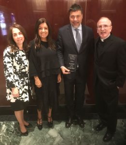 (L-R) Donna Rapaccioli, Ph.D., dean of the Gabelli School, Cecilia Werthein, Alumni Award recipient Dario Werthein, GABELLI ‘91, and Joseph M. McShane, S.J., president of Fordham at the 2018 graduate awards brunch on May 14.