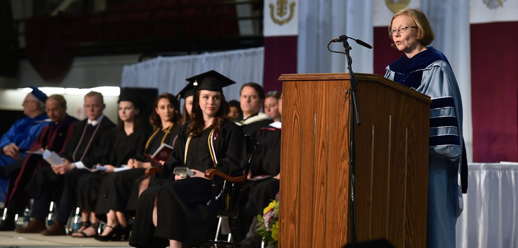 Maura Mast, Dean of Fordham College at Rose Hill, addresses Encaenia 2018 at the Rose Hill Gymnasium