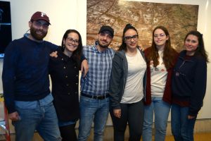 Italian exchange students pose in the Ildiko Butler Gallery on the Lincoln Center campus 