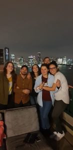 Students pose for a picture along the waterside in Lower Manhattan.