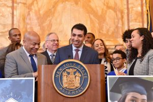 Yohan Garcia speaking from a podium at the state capitol in Albany