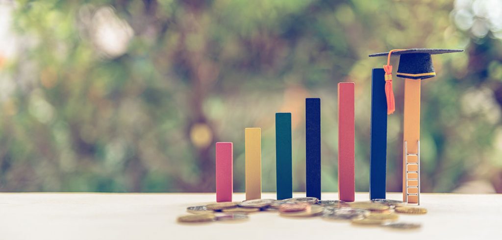 colored bars with a graduation cap perched on one and coins beneath them