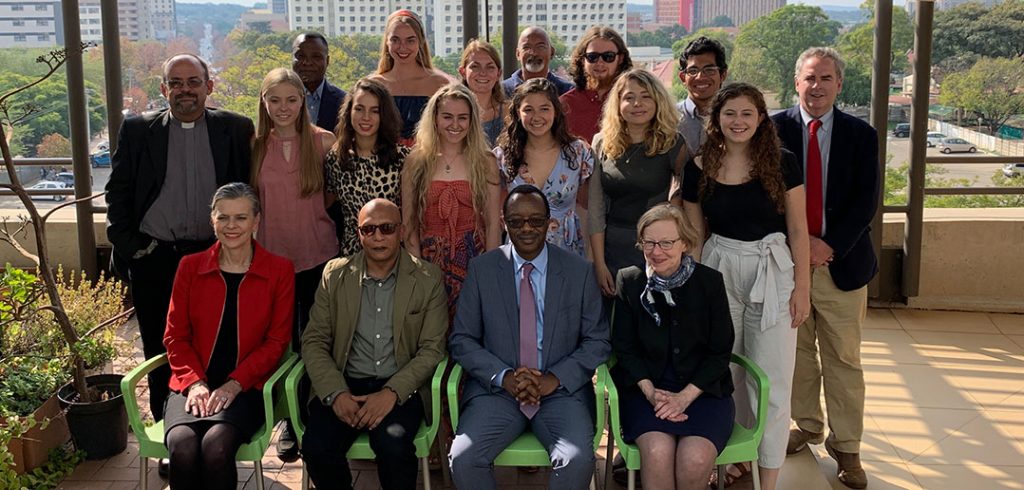 Students and staff pose for a group picture in South Africa