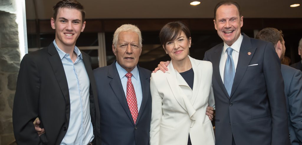 Daniel Nuñez, Alex Trebek, and the evening's hosts, Madeline McFadden-Nuñez and Armando Nuñez