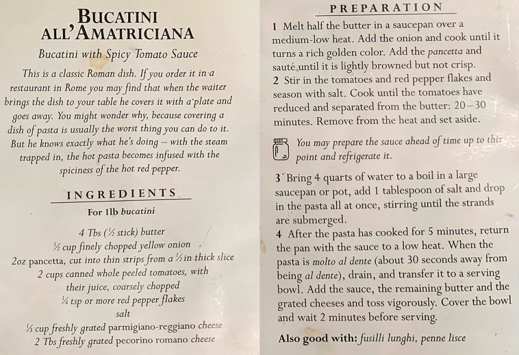 A stained recipe for Bucatini al'amatriciana from Laura Auricchio's copy of The Classic Pasta Cookbook