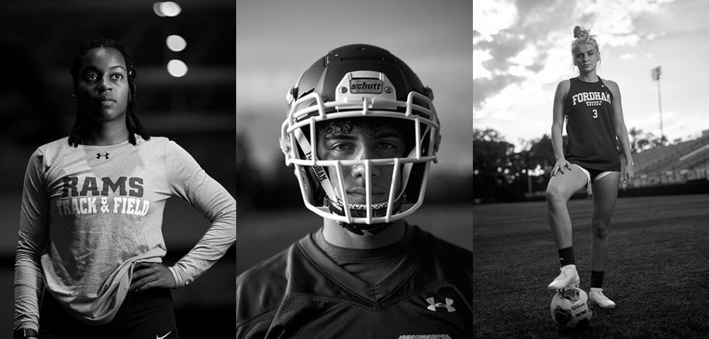 Three athletes pose for pictures