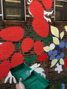 A fruit and vegetable garden on a brick wall