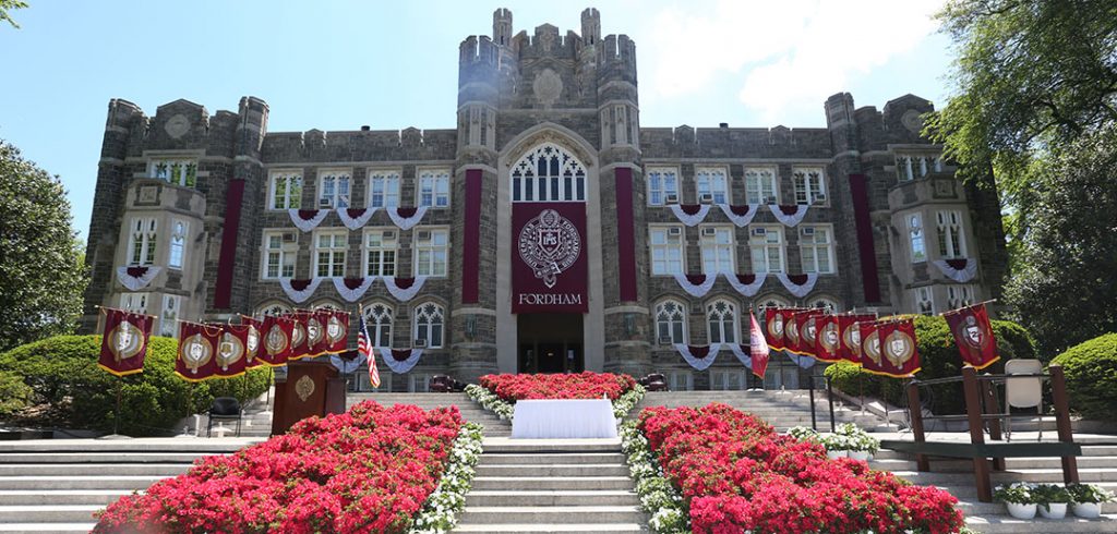 Commencement Stage with flowers outddors