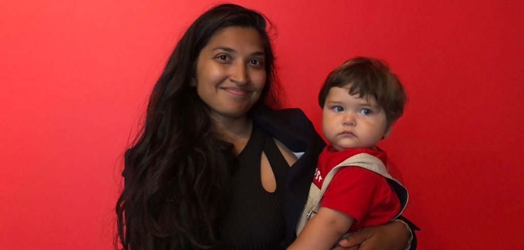 A woman poses with her son