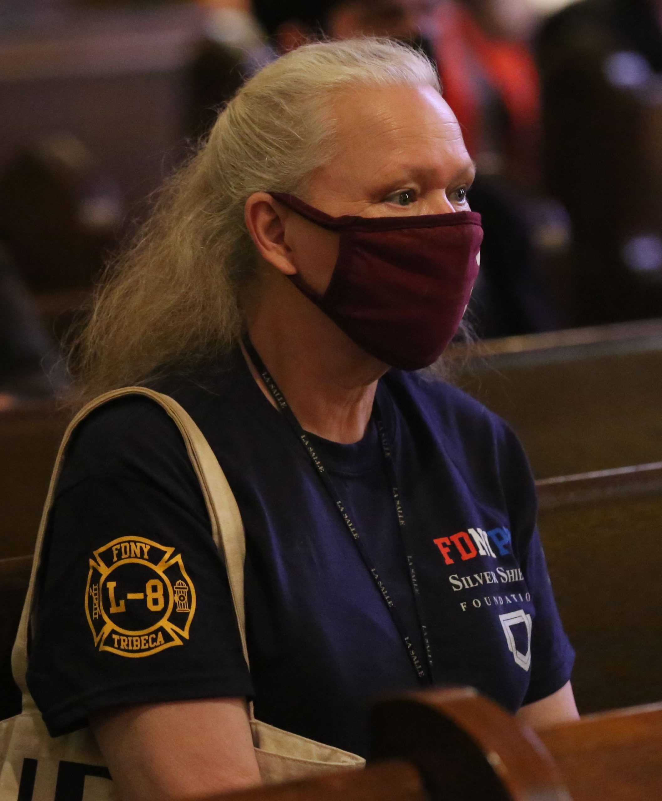 A woman at the 9/11 memorial Mass