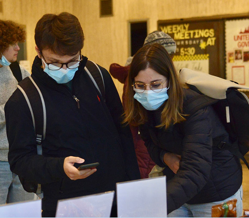 Students checking out the First Gen Network at a sign-up event Nov. 8