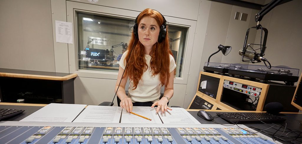 A girl at an audio board