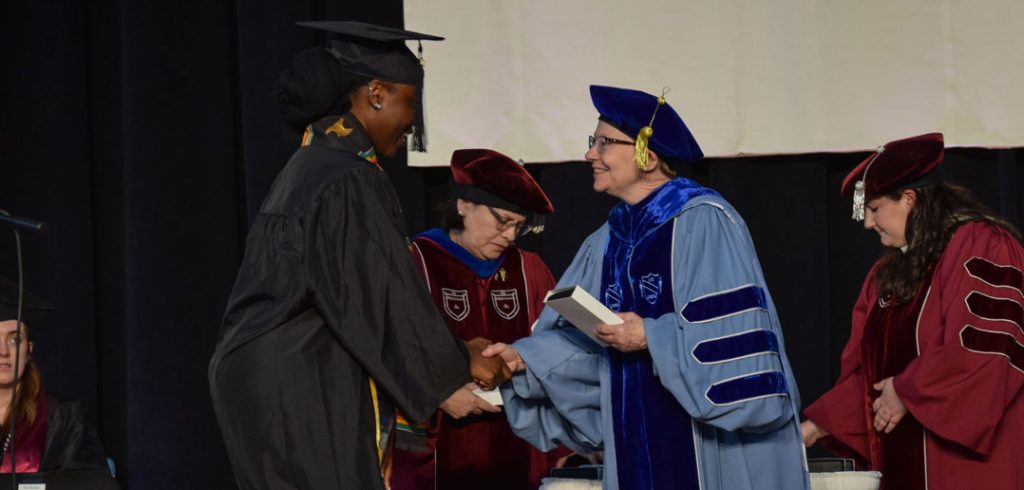 A student receives an award