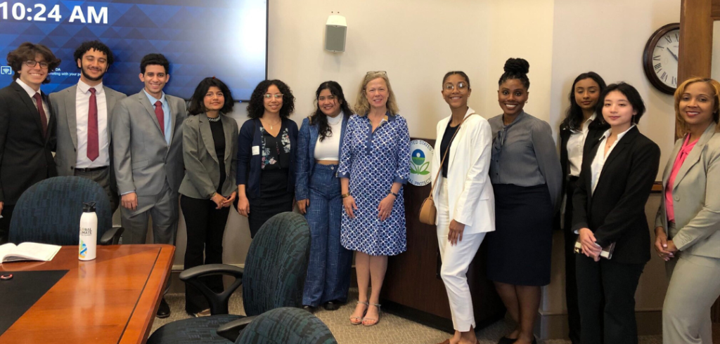 IDEAL and REAL students meeting with Vicki Arroyo, associate administrator for policy at the United States Environmental Protection Agency. All dressed in professional attire.