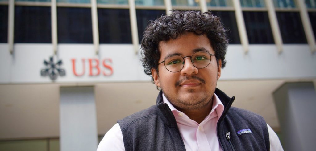 German Ortega stands in front of a UBS sign.