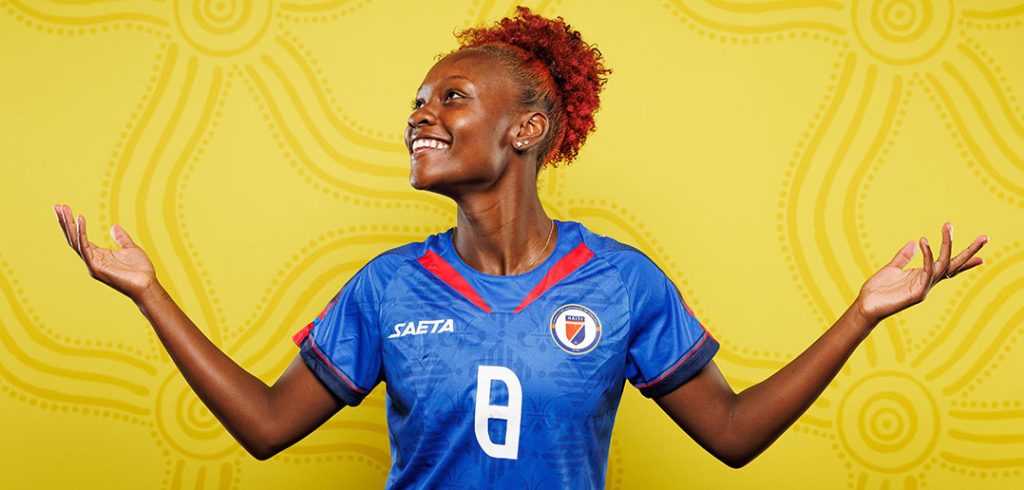 Fordham graduate Danielle Étienne, a member of the Haitian national team, poses in her uniform prior to the 2023 Women's World Cup