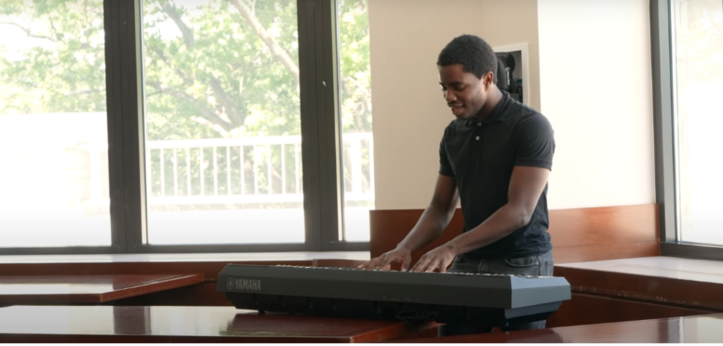 Samuel Scriven plays piano