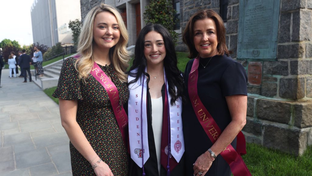 Julia Murphy, Carolyn Cardell, and Sheila Cardell in front of the Rose Hill Gym.