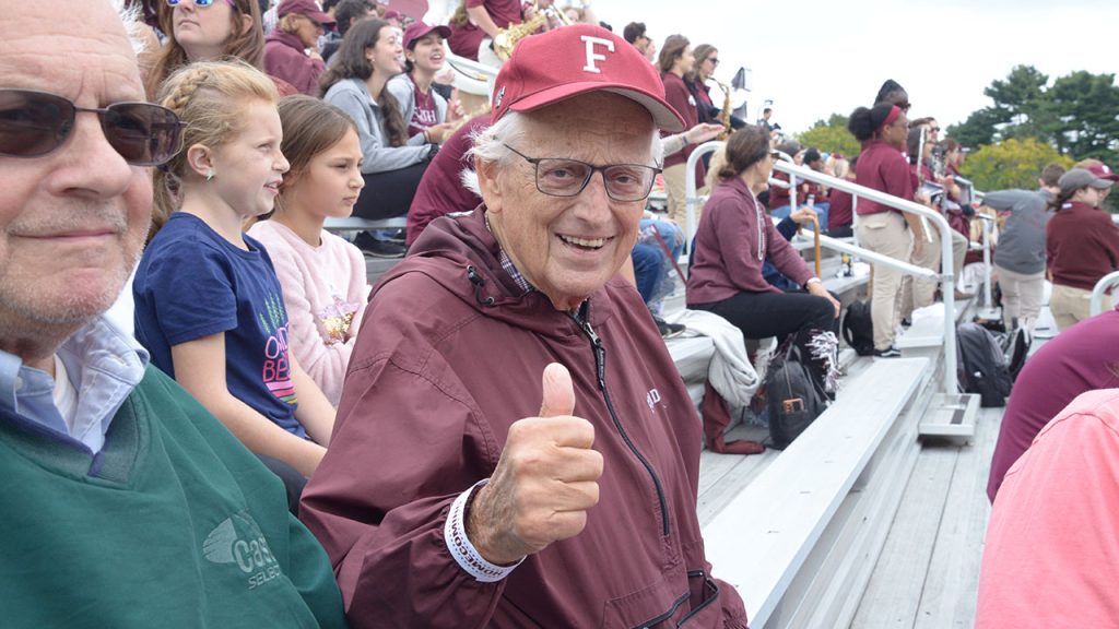 Bill Pascrell poses in the stands at a Fordham football game.