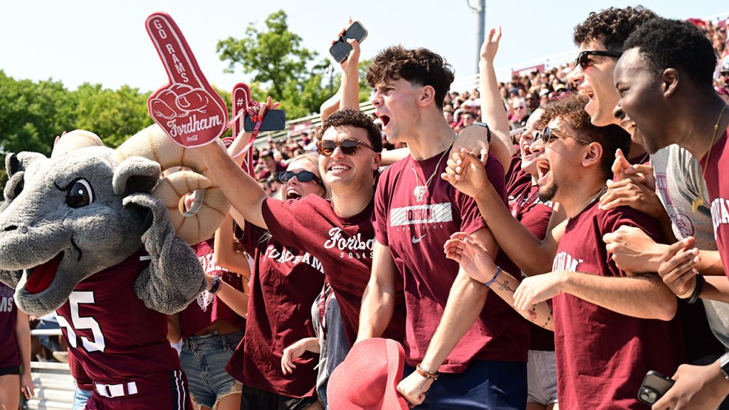 Fordham fans cheer at Homecoming 24 with Ramses.