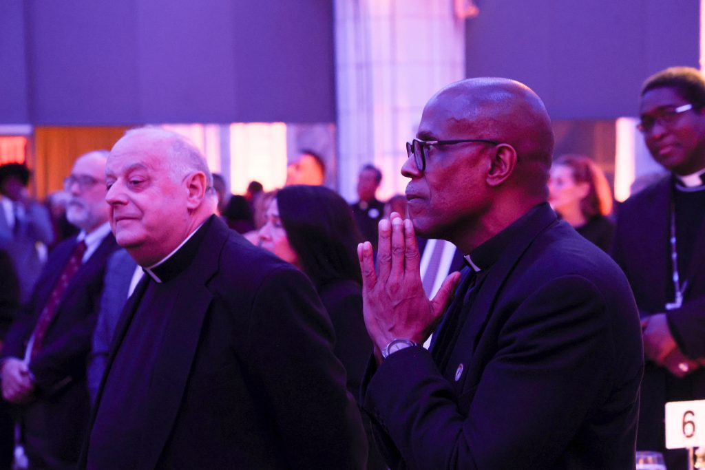 A picture of Rev. Bryan Massingale, S.T.D., the James and Nancy Buckman Professor of Theological and Social Ethics at Fordham, before leading the invocation.