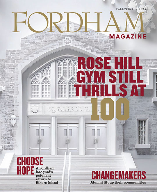 Fordham Magazine Fall/Winter 2024 cover image features an off-white paper cutout illustration of the Rose Hill Gymnasium and the following coverlines: Rose Hill Gym Still Thrills at 100, Choose Hope: A Fordham law grad's poignant return to Rikers Island, and Changemakers: Alumni lift up their communities