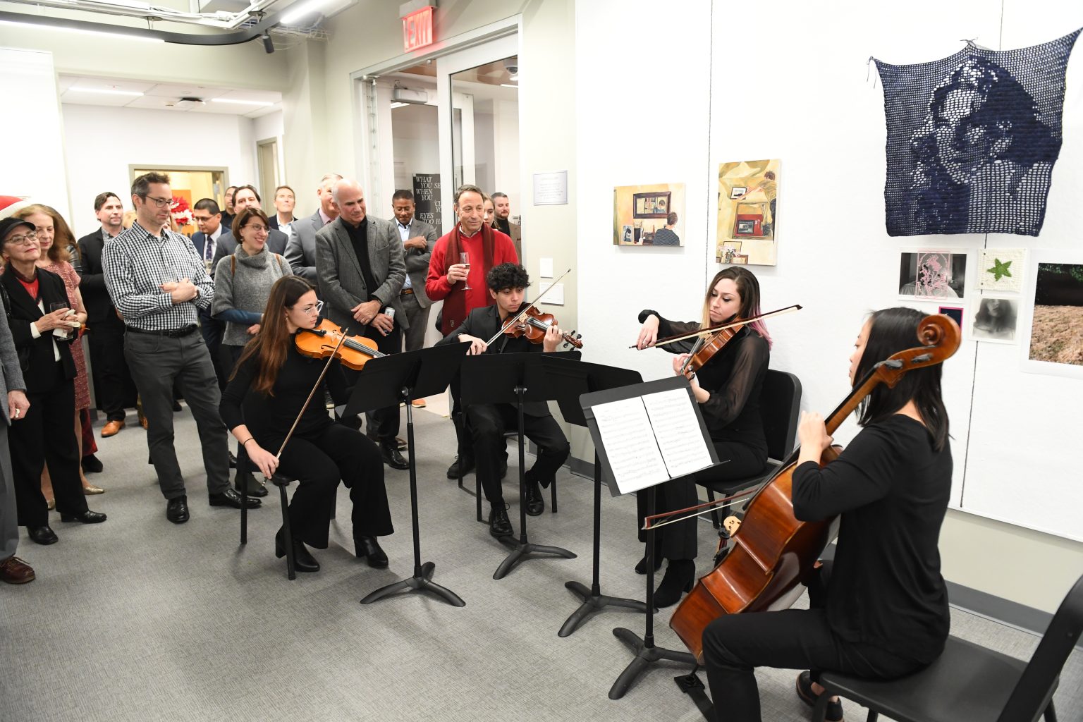 Student musicians performing at the dedication of the Robert R. Grimes, S.J. Music Studios